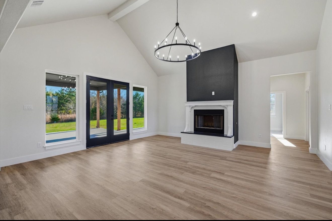 Vaulted interior with fireplace