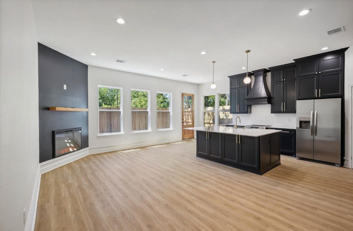 Kitchen and living — Dark cabinetry