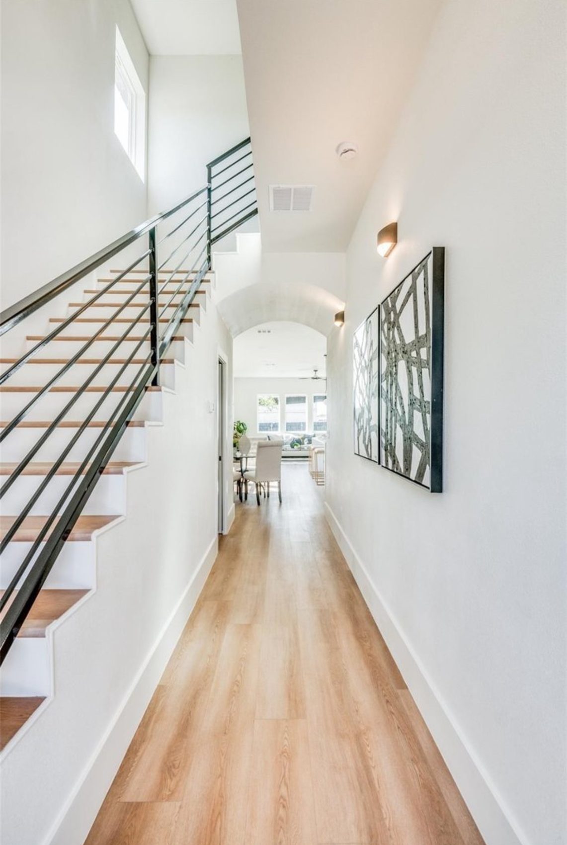 Floating stair with metal rail