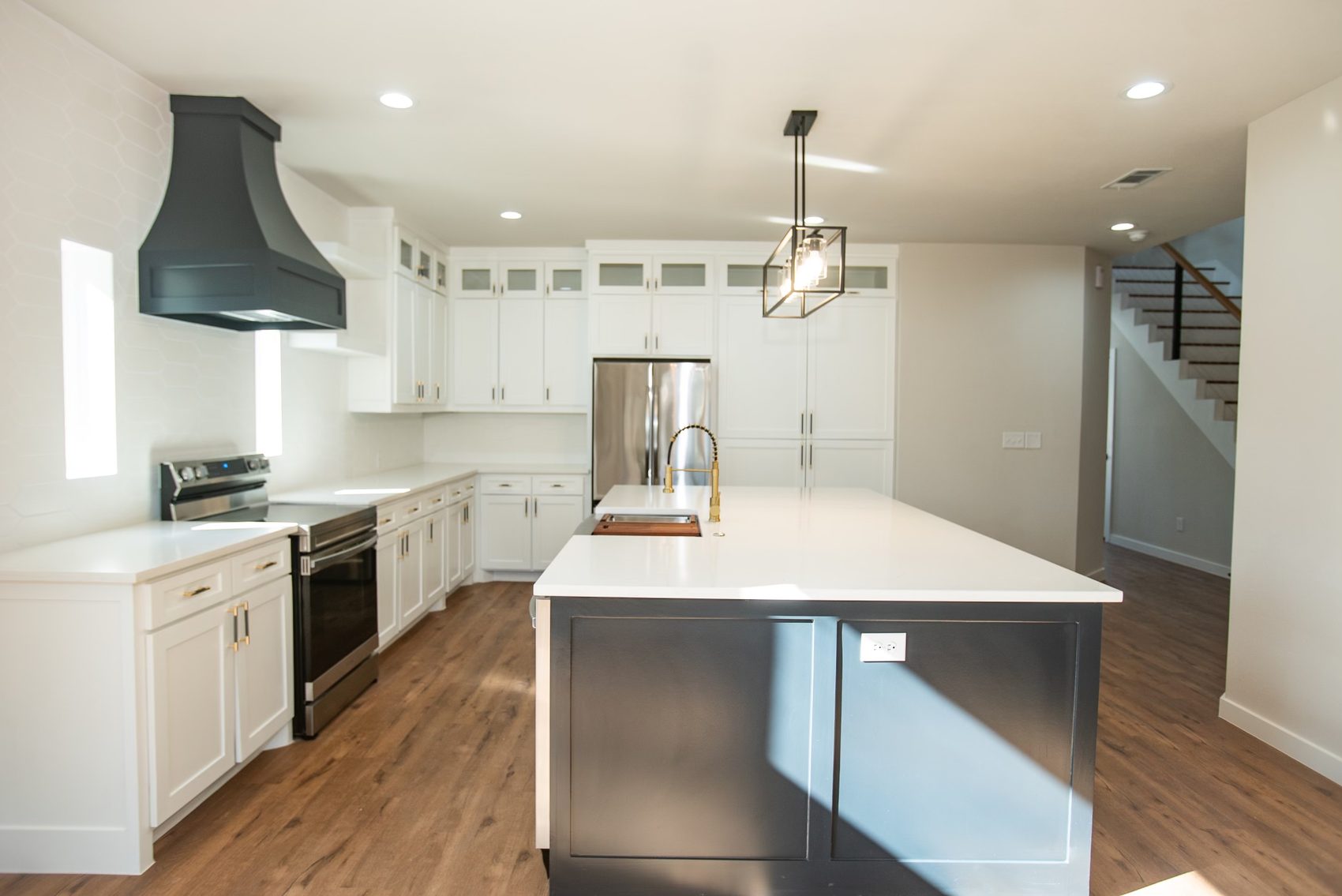 White kitchen with black hood